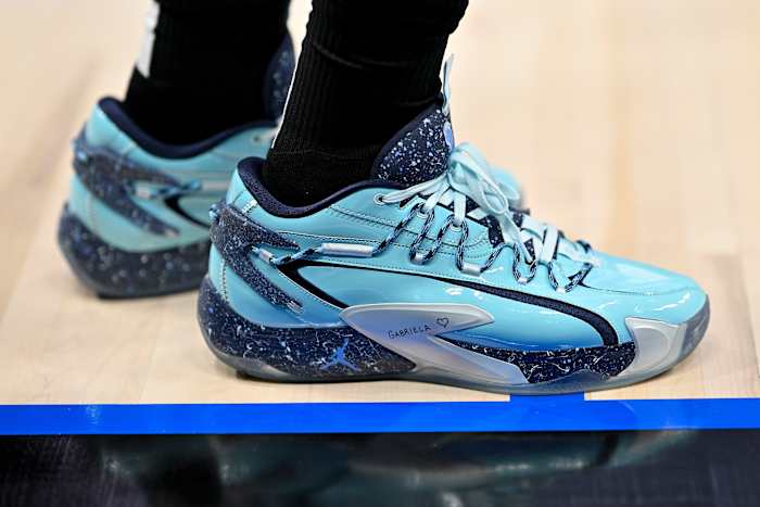 Luka Doncic's blue and navy 'UNC Tar Heels' Jordan Brand sneakers.